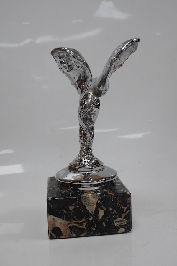 A chrome Spirit of Ecstasy car mascot on marble base, 13.5cm high not including marble base. Condition - good